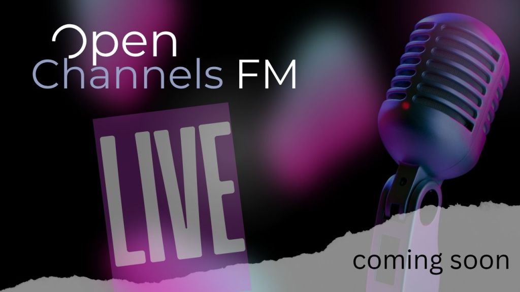Promotional image for Open Channels FM featuring a microphone and the text 'LIVE' and 'coming soon'.